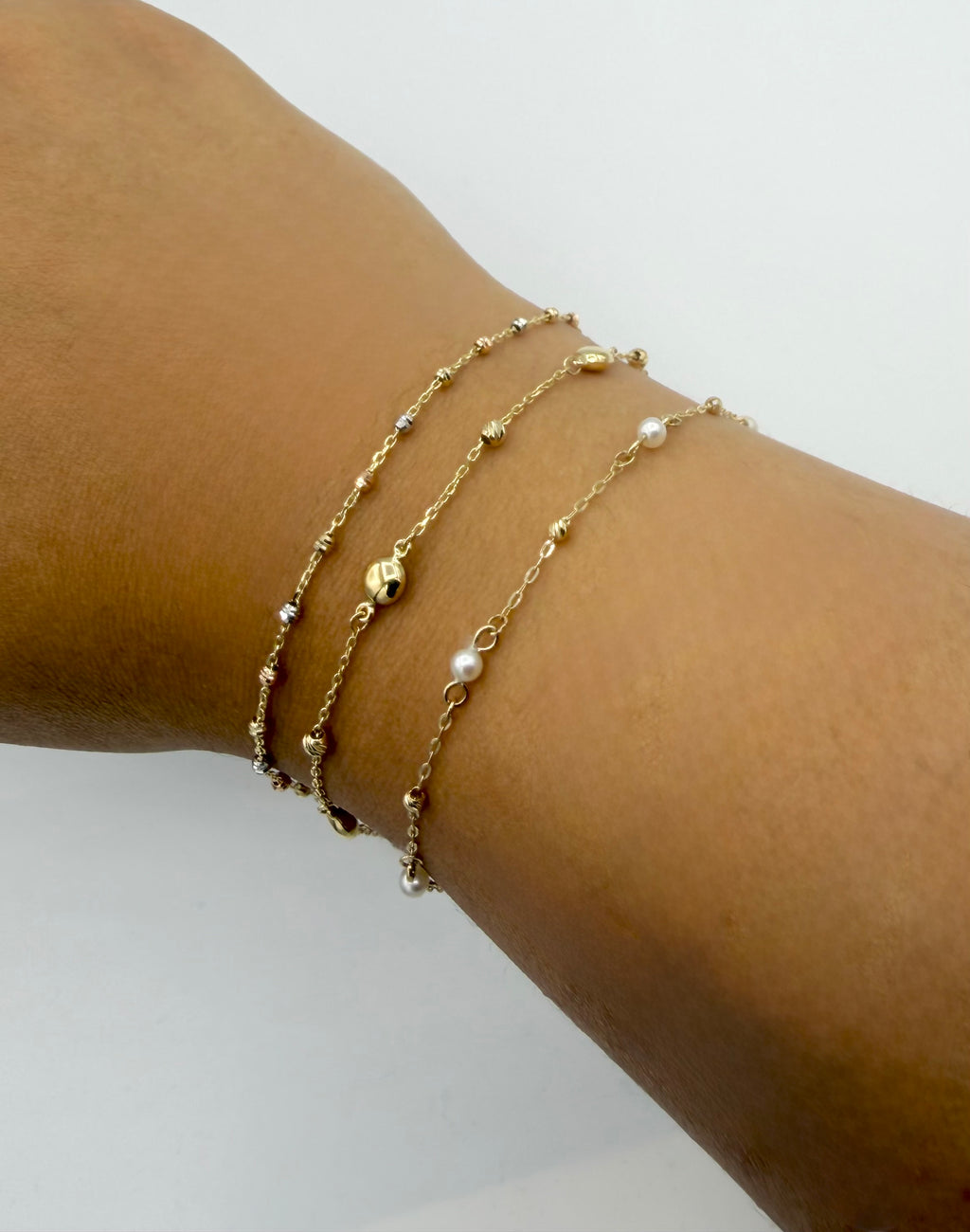 Tri-Color Gold Diamond-Cut Bead Bracelet
